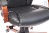 Кресло T-9923WALNUT/BLACK. Обивка - кожа, цвет черный. Деревянная крестовина. Механизм со смещенной осью качания с возможностью фиксации в нескольких положениях. Нагрузка до 200 кг